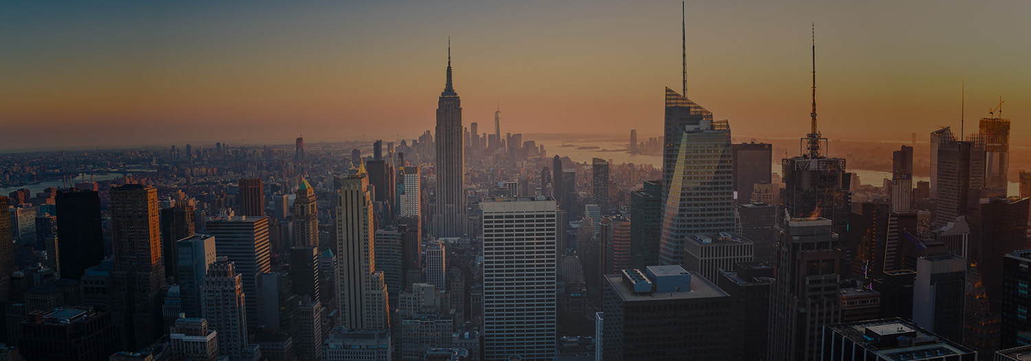 NYC skyline with Empire State Building at sunset