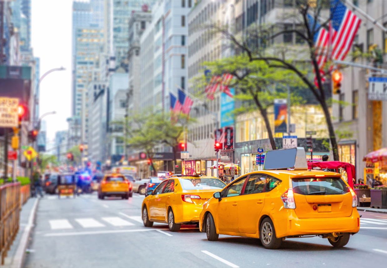 Yellow taxis on a busy NYC street