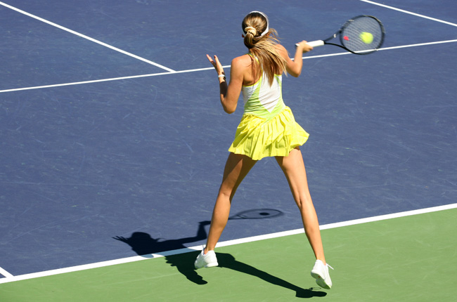 Tennis player hitting a shot at the US Open