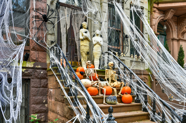 Halloween-decorated brownstone stoop in NYC