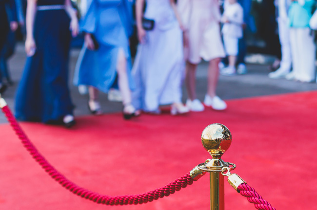 Red carpet event with velvet rope barrier